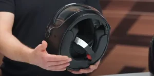 The interior is equipped with antimicrobial PU leather and suede which represents a major upgrade from the original Bullitt's Alcantara lining.
The synthetic leather trim runs around the visor aperture and helmet bottom, while the rest uses a soft, comfortable fabric that feels plush against your head.